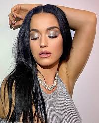 Katy Perry wows in shimmering skirt and knitted tank top in glamorous snaps  ahead of American Idol