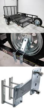 It finally arrived but without any instructions. Fulton Hi Mount Spare Tire Carrier Fits 4 And 5 Lug Wheels Fulton Spare Tire Carrier Fstc1000301 Utility Trailer Deck Over Trailer Camping