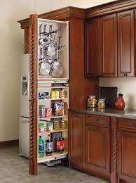 Store and organize kitchen essentials on this adjustable cabinet organizer. 45 Tall Filler Pullout Organizer With Wood Adjustable Shelves Tall Pantry Accessories Kitchen Pantry Cabinets Interior Design Kitchen Kitchen Remodel