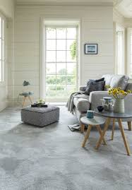 Wood and metal accessories and wood floor shine in this layout. 19 Grey Living Room Ideas Grey Living Room