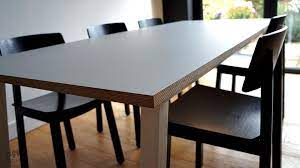 I finish the table top with an oak trim using some offcuts from some salvaged hat and coat stands, and coat it in superior danish oil and some rustic pine briwax. Plywood Table