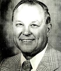 Urbin Rudell in his Oakland automobile in 1936. He ran a battery shop from  his home located at 225 elm street.