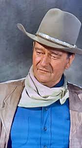 JOHN WAYNE IS THE FASTER DRAW.