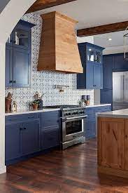 This shade is a practical one, one that will last you for years. 4 Reasons To Jump On The Navy Cabinet Kitchen Trend Nebs