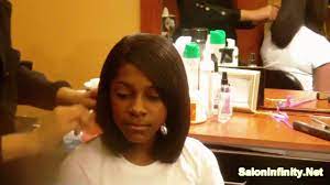 A hair scarf is a great addition for any black hair updo with wrap and there are countless versatile options. Black Hair How To Wrap Your Hair Saloninfinity Youtube