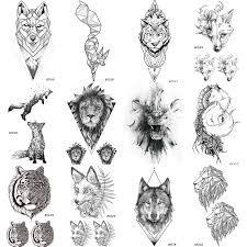 The tattoo is unique design as the butterfly appears as if it has landed on the leg. Amazon Com 12 Pieces Lot Coktak Real Tribal Tiger Face Temporary Tattoos For Women And Men Body Art Fake Black Waterproof Fox Tatttoo Sticker Lion Design 10x6cm Beauty Personal Care