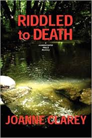 A dead body is found at the bottom of a multistory building. Riddled To Death Joanne Clarey 9780976810872 Amazon Com Books