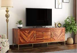 Why don't you use that thing to make your own costless tv stand? Tv Units Upto 55 Off Buy Wooden Tv Unit Tv Stands Online In India