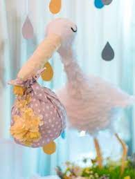 This doesn't necessarily sound incredibly exciting on the first read, but just look at these decorative paper lanterns. 35 Stork Theme Baby Shower Ideas Baby Shower Stork Baby Showers Baby Shower Themes