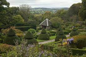Beneath The Brambles C F A Voysey In An English Garden Gardenista English Garden English Country Gardens Gardenista
