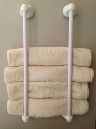 100均タオルハンガーの収納アイデアが とっても使える naver まとめ how to fold towels diy bathroom towel storage