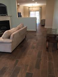 This thin, dense foam layer helps to absorb sound, provides a thermal. Replace Carpet With Wood Look Tile Floor Coverings International Birmingham
