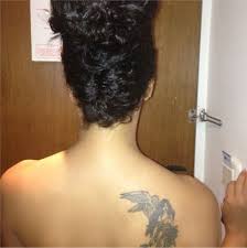 Tonto dikeh shows off neck tattoo in stuning photos. A Topless Nadia Buari Shows Off Her Guardian Angel Check Out Photos Of The Ghollywood Superstar S New Tattoo Bellanaija