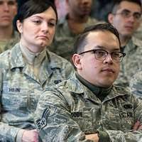 US Air Force (USAF) STAFF Sergeant (SSGT) Brent Niles participates in a  litany reading during the First Annual flightline worship service and  picnic held in hangar Four at MacDill Air Force Base (
