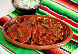 Bistec En Salsa Roja De Guajillo Our Chuletas Con Nopalitos En Salsa Guajillo Recipe Is Total Mexican Comfort Food The Warmth Of Th Mexican Salsa Recipes Mexican Food Recipes Nopalitos Recipe