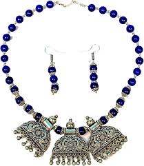 Buy Nisha Creations Blue color glass bead with silver fancy pendant set at  Amazon.in