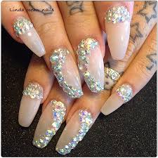 Pin On Rhinestones Nails If that unique design isn't enough to catch eyes, then the red accent nails and sparkly diamonds will do the trick.