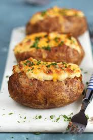 Super Easy Twice Baked Potatoes With Cheddar And Chives Are The Ultimate Make Ahead Side Dish For Every Occassion Perfe Easy Twice Baked Potatoes Recipes Food
