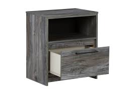 Clean lines and modern charm blend for an authentic look to be enjoyed for years to come. Baystorm Nightstand Ashley Homestore Canada