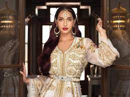 She is chiefly known for her gorgeous look and glamorous style in the films. Nora Fatehi Will Mesmerize You In This Traditional Moroccan Outfit Hindi Movie News Times Of India