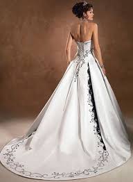 Sleek White Wedding Dress With Corset Back Behind Wedding Dress Black Wedding Dresses Inexpensive Wedding Dresses Wedding Dresses Corset