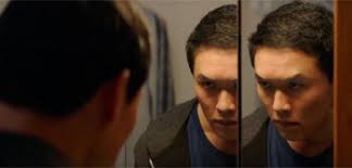 Kenny Leu Struggles with His Guilt in 'A Shot Through the Wall' Trailer