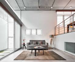 The prototypical layout of the split level home tends to separate the entrance, and any other associated space, from the rest of the living spaces one half level up. House S Urban Home With A Split Level Living Area And Ample Natural Light