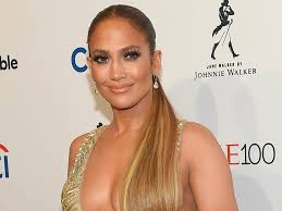 After the event, images of lopez in the green dress were downloaded 642,917 times in just 24 hours from the grammy website. Jennifer Lopez Updated The Naked Dress Look With A Sparkling Cape