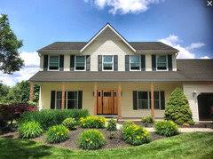 Grabbing attention at the front door: Color For Front Door On A Yellow House