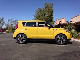 Press this and you will open the trunk. 2014 Kia Soul In Solar Yellow Kia Soul Kia Old Yeller