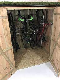 Studio Pic Of A 4 Bike Vertical Bike Shed Bike Storage Diy Vertical Bike Storage Bike Storage