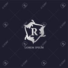 A unique and creative way to explore the english alphabet!this animated story of 'robin and the rainbow' tells a funny tale, and helps you . Letter R Alphabet Logo Design Template Initial Abjad Company Logo Silver Metallic Luxury Decorative Floral Vector Design Concept Suitable For Beauty And Fashion Product Isolated On Navy Blue Background Royalty Free Cliparts