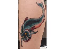 A rod's hook has dropped into the water and water splashes can be seen, the second constituent is the phrase: Catfish Tattoos Ferrebeekeeper