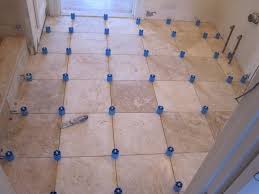 How To Install Travertine Tile With Proleveling System Travertine Tile Budget Flooring Ideas Flooring