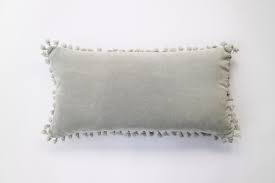 The timeless design of this patterned throw pillow gets a playful twist thanks to tassels at each corner. Velvet Tassel Breakfast Cushion Light Grey Mw Home