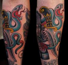 Daggers are often seen as more ruthless and cutthroat weapon than the sword, which is much longer, elegant, and primarily a snake wrapped around a dagger is a common symbol of healing and medicine, and is thus a popular tattoo with medical professionals around the world. Arm New School Snake Dagger Tattoo By Salt Water Tattoo
