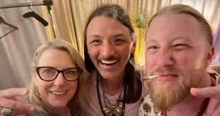 Susan Tedeschi and Derek Trucks stop for this great photo before the Allman  Brothers Band performance during Farm Aid 2007 at lcahn Stadium. Randall's  Island. New York City, NY. September 9, 2007.