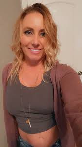 Who is the woman sending photos to my husband?