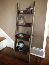 The top shelf is flush with the top of the 18 inch boards, and starts from the middle of the left most board. Rustic Wooden Ladder Shelf Handmade Shelf Rustic Decor Tea Etsy Rustic Bookshelf Ladder Bookshelf Wooden Ladder Shelf