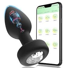 Trashy blonde bitch stuffs her butt hole with massive butt plugs