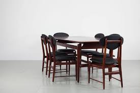 We are proud to manufacture such a desirable and functional array of assembled dining tables, made from premium materials perfect for the outdoor environment. Set Of Italian Dark Teak Wood Dining Table And 6 Chairs 1950s For Sale At 1stdibs