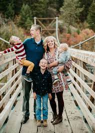 Family Of Five On A Bridge In Spokane Washington Laughing And Unposed Lifestyle Shot In The Wood Photography Poses Family Family Posing Fall Family Portraits