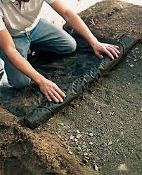 How To Lay A Budget Friendly Gravel Path Gravel Path Landscape Fabric Gravel Pathway