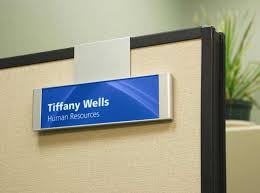Metal office sign with hanging display bar. Hanging Cubicle Signs Cubicle Name Plates Office Workstation Signs