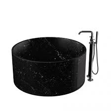 There's a freestanding tub on the corner. Agape In Out Freestanding Bathtub In Marble Tattahome