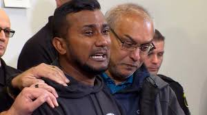 Slain officer's brother gives emotional statement after suspect arrest