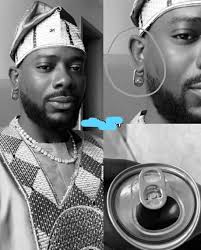 Adekunle Gold's Unconventional Earring Made from Malt Opener