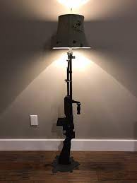Black etagere floor lamp with 3 wood storage shelves and linen shade. April 2017 Soldier Systems Daily