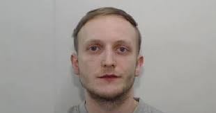 Salford petrolbomb murderer Zak Bolland smirks in mugshot with arms crossed  hours after killing four children