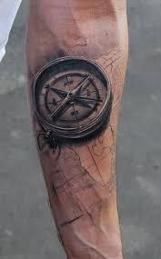 Brown and black shades meld together in this compass and map tattoo. 23 Great Compass Tattoo Ideas For Men Styleoholic